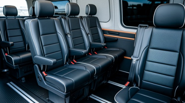 champaign sprinter van with driver inside